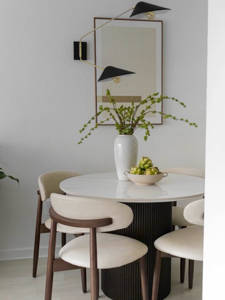 Photo shared by Fam Del Orbe | Interior Designer on July 29, 2026 tagging @wayfair, @ltk.home, and @amazonhome. May be an image of table, lighting, armchair, dining table, indoors 